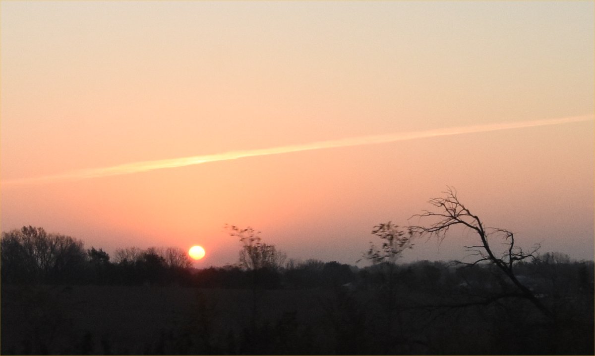 landscape with sun setting into the background